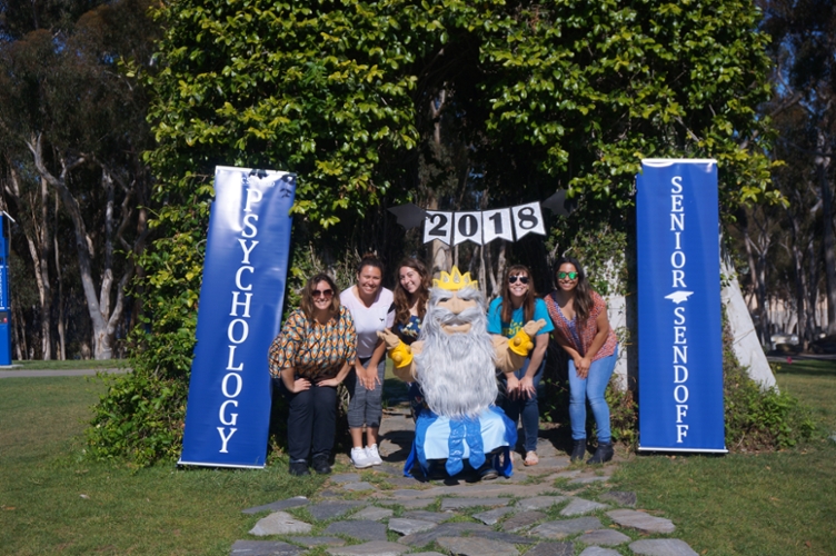 Psychology staff pose with the Triton, photo by Yuchen Jasmine Wu