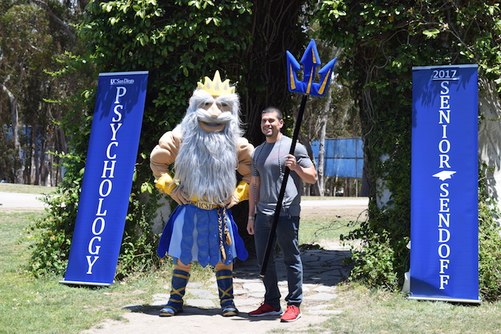 Grads pose with the Triton, photo by Yang Lu