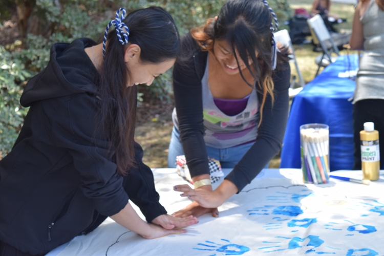 Students leave their mark on the crafting table, photo by Yang Lu